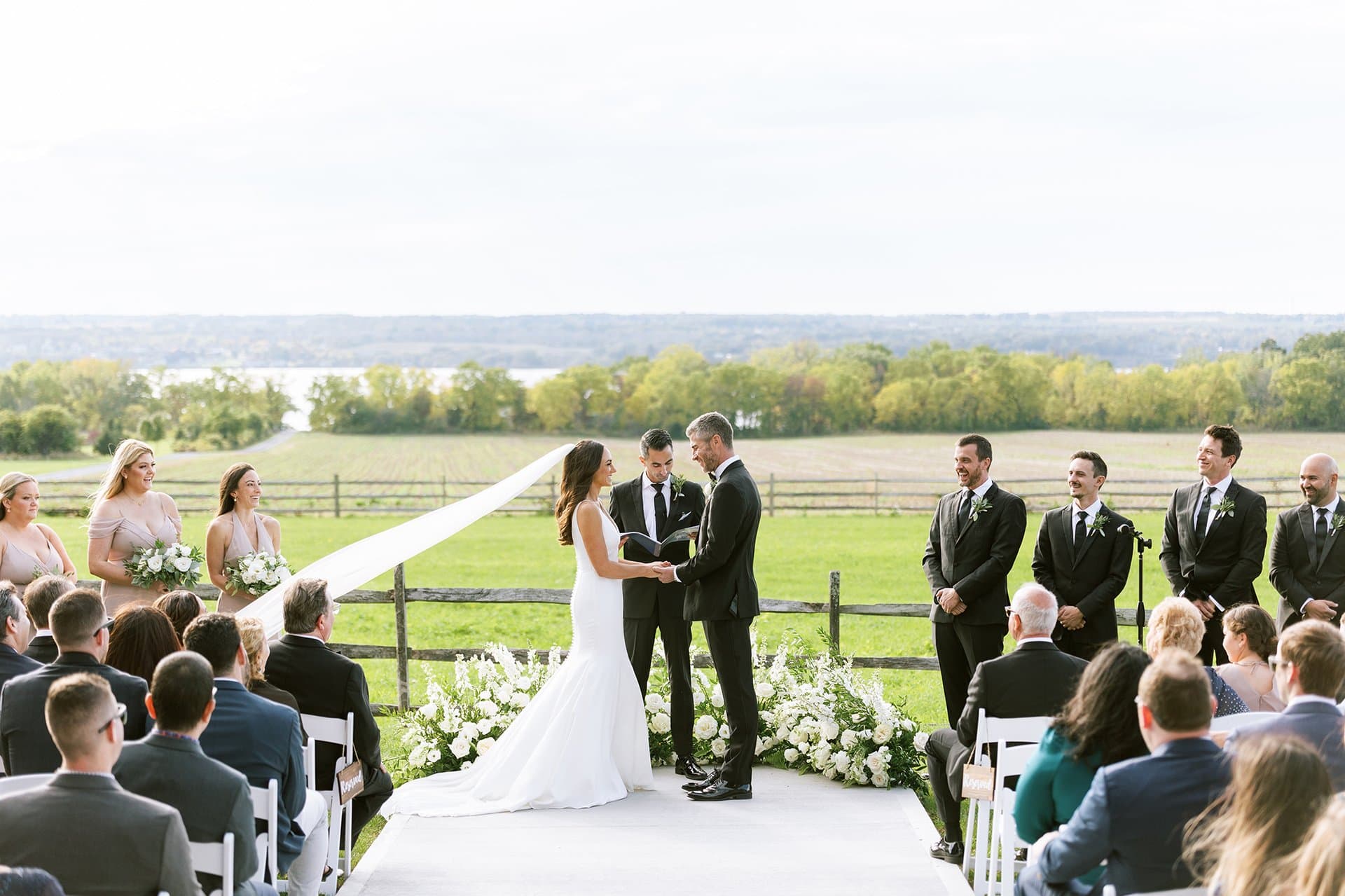 Outdoor wedding ceremony at Seneca Ridge overlooking the Finger Lakes